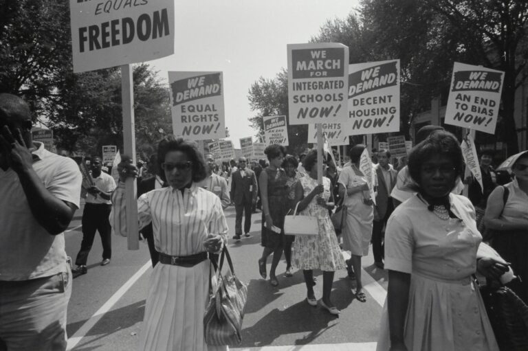Kelsie Brook Eckert talks about the Remedial Herstory Project - image of women of colour protesting at a US integrated schools demonstration
