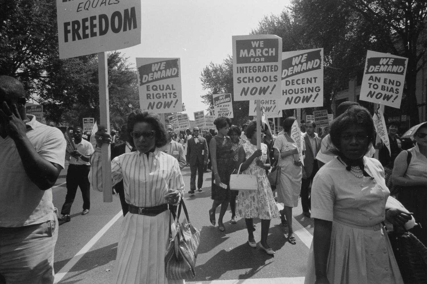 Kelsie Brook Eckert talks about the Remedial Herstory Project - image of women of colour protesting at a US integrated schools demonstration