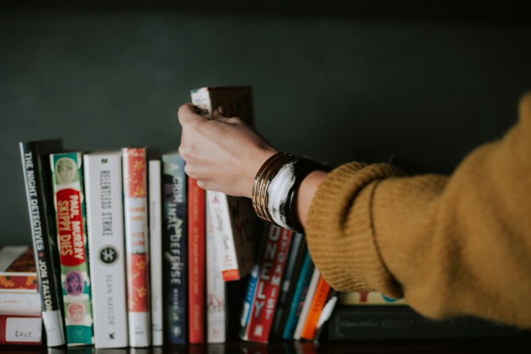 ESIS World Book Day Study - image of a woman selecting a book from a shelf