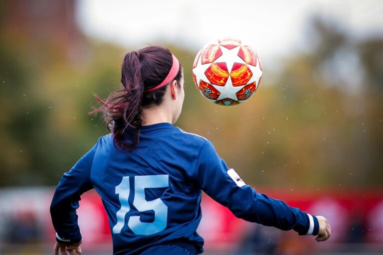 Helping Girls Reclaim Their Confidence - image of a girl playing football, or "soccer" if you're outside Europe
