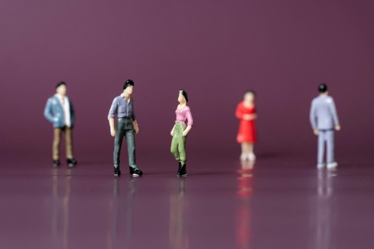 The limited role for RSHE in tackling shool sexism - image of female and male figurines on a purple background
