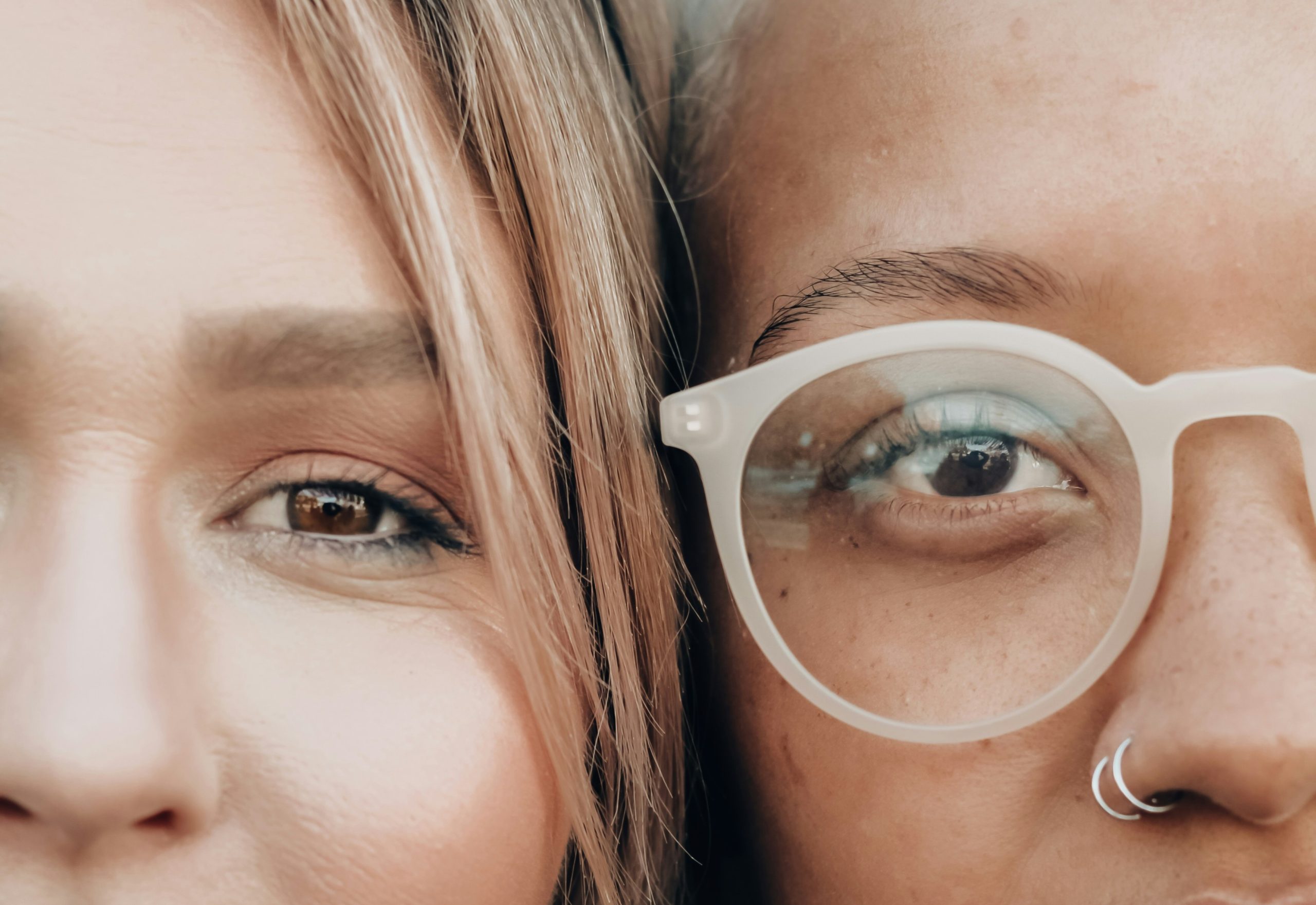 No more shame for victims - close up image of 2 proud women